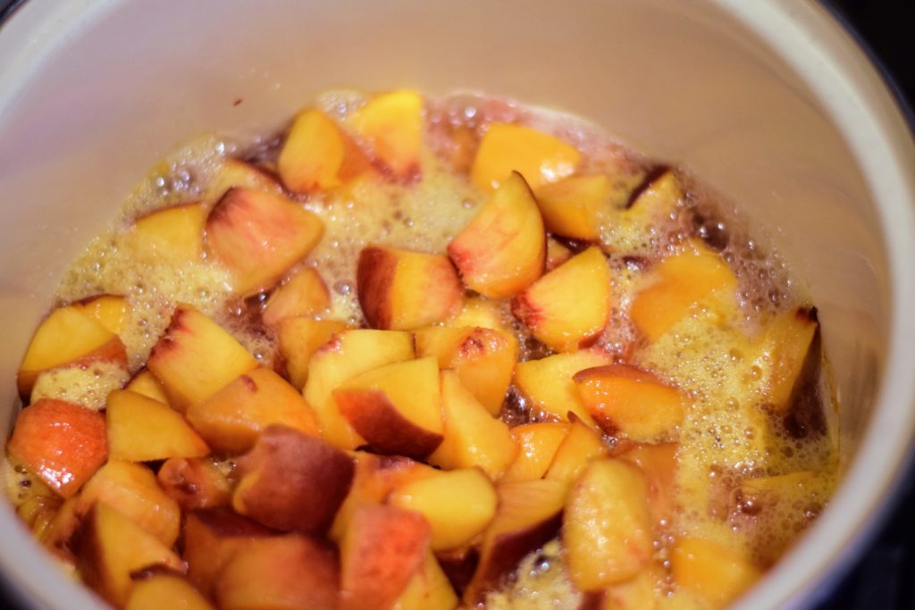 cooking peaches for canned peach syrup from Spirit's Freedom Farm