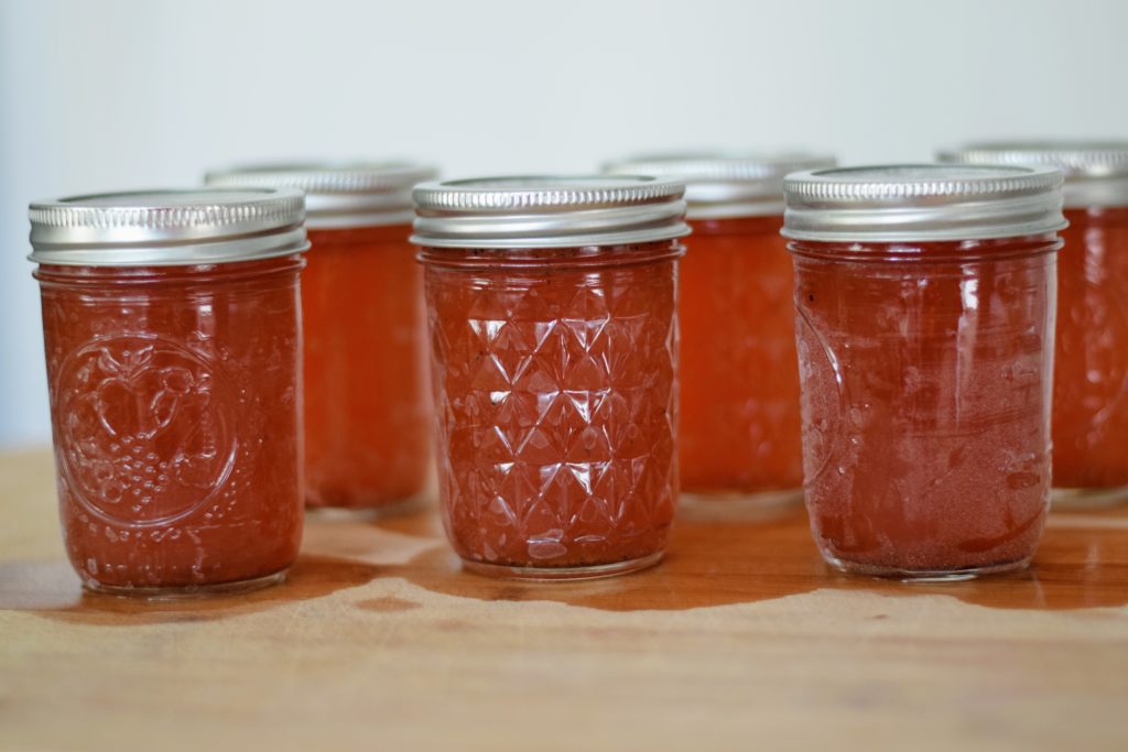 beautiful jars of canned peach syrup at Spirit's Freedom Farm